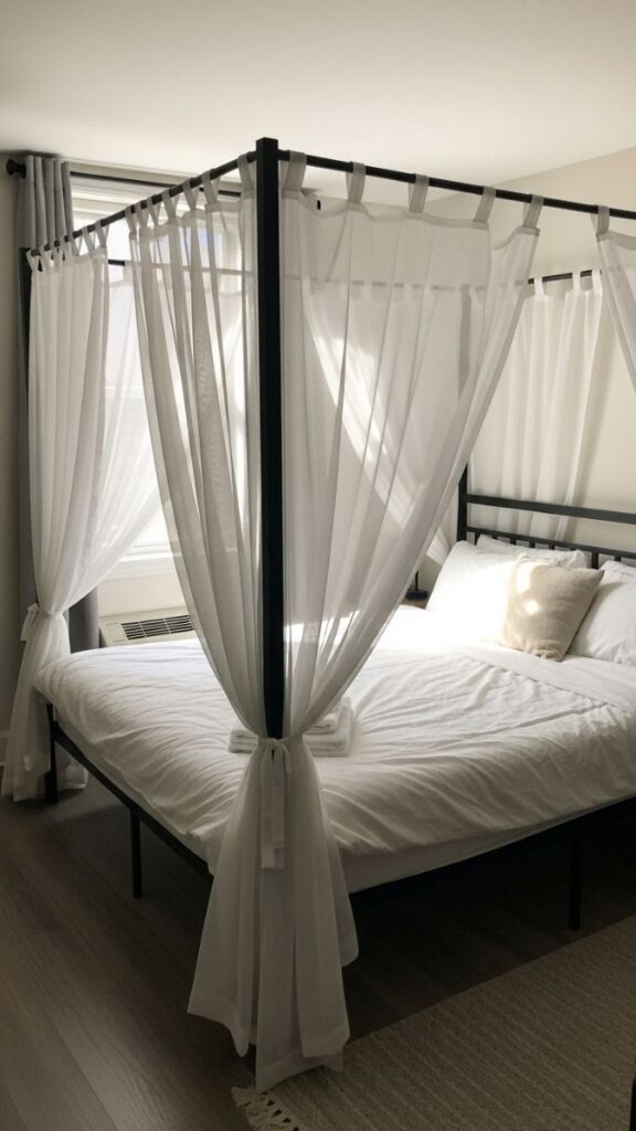 Separate Sleeping and Living With a Canopy Frame Above the Bed