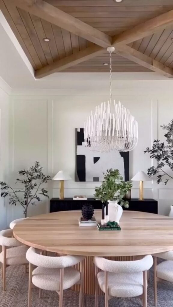 21 Dining Room Lighting Over Table Ideas That Change How the Whole Room Feels 5 A Statement Chandelier in a Small Dining Room