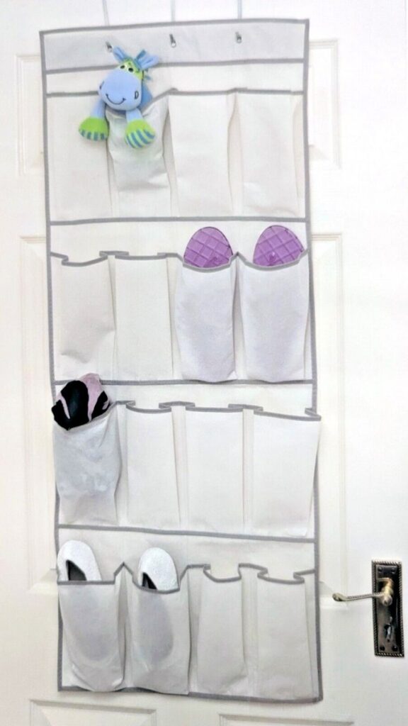 24 Kids Room Storage Ideas That Actually Keep the Chaos Under Control 6 Hanging Fabric Organizer Over the Back of the Door