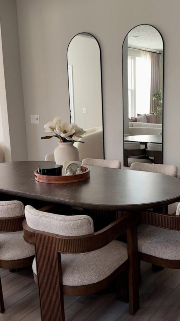 Mirrored Wall or Large Mirror to Visually Double the Space