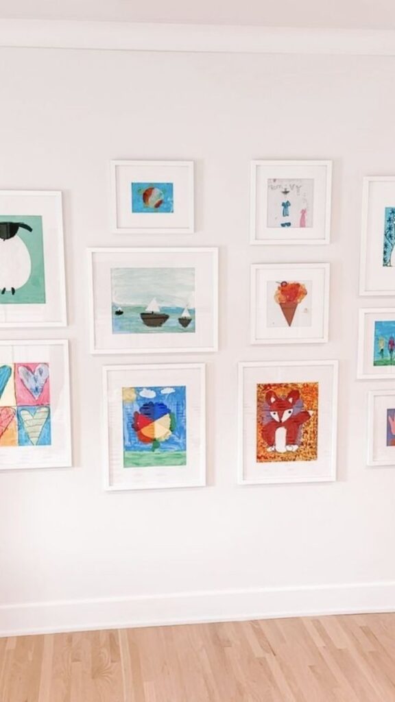 24 Kids Room Storage Ideas That Actually Keep the Chaos Under Control 10 Wall-Mounted Art Display Rail for Rotating Kids' Artwork