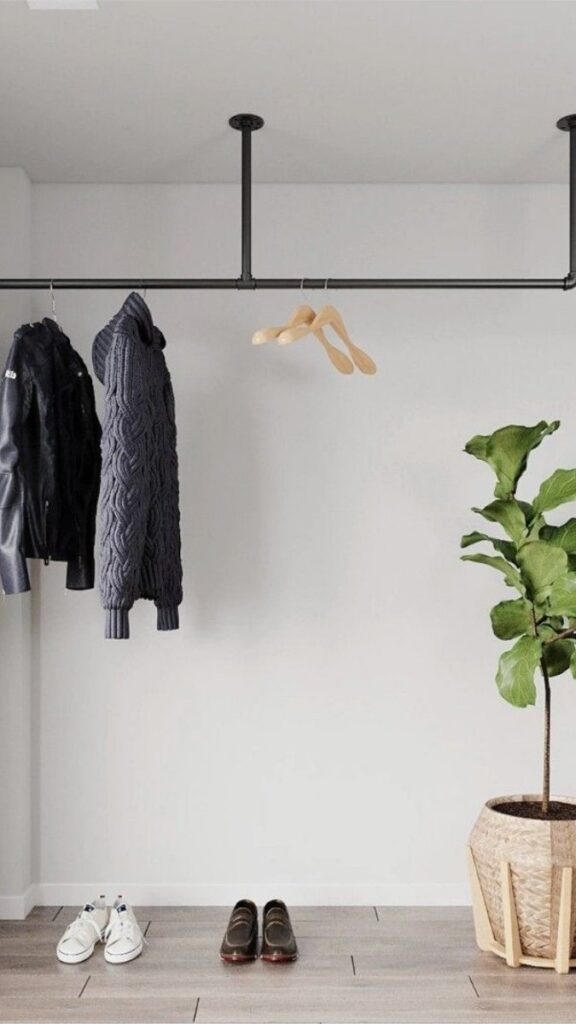 24 Kids Room Storage Ideas That Actually Keep the Chaos Under Control 3 Wall-Mounted Rail System With Interchangeable Hooks and Baskets